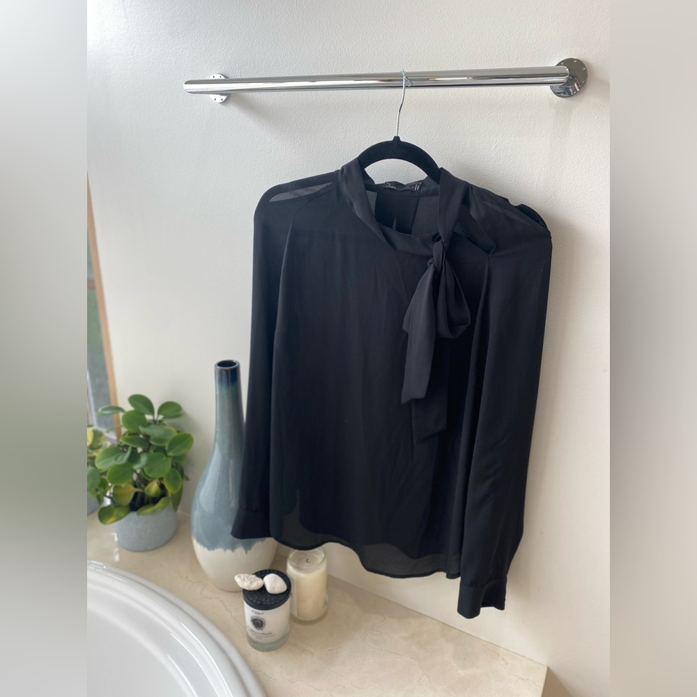 Blouse with shoulder cut outs